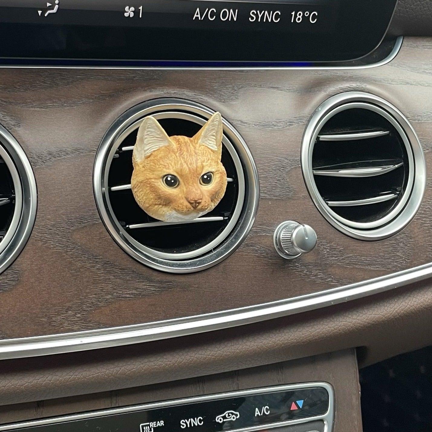 Close-up of handmade custom pet portrait car freshener showing detailed car photo print